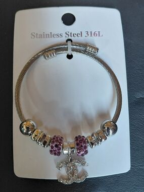 Stainless Steel Cable Fashion Bracelet with Purple Crystal Accent Charm